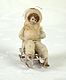 Girl on Sled with muff